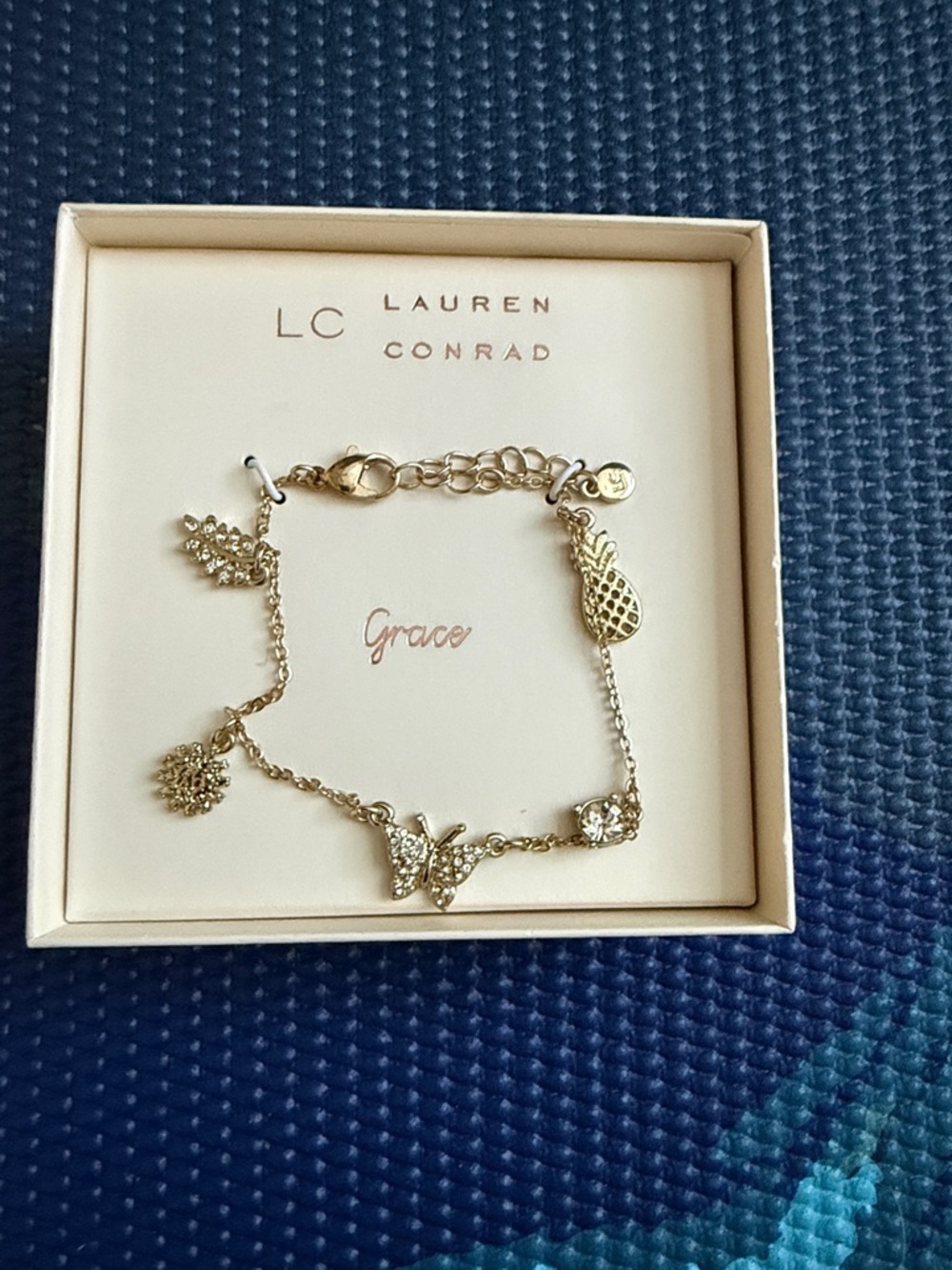 LC Lauren Conrad Gold Charm Bracelet with Butterfly, Pineapple & Floral Charms